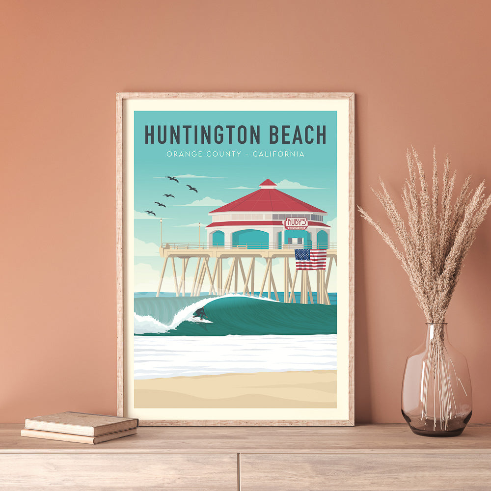 Framed California surf poster with a vase 
